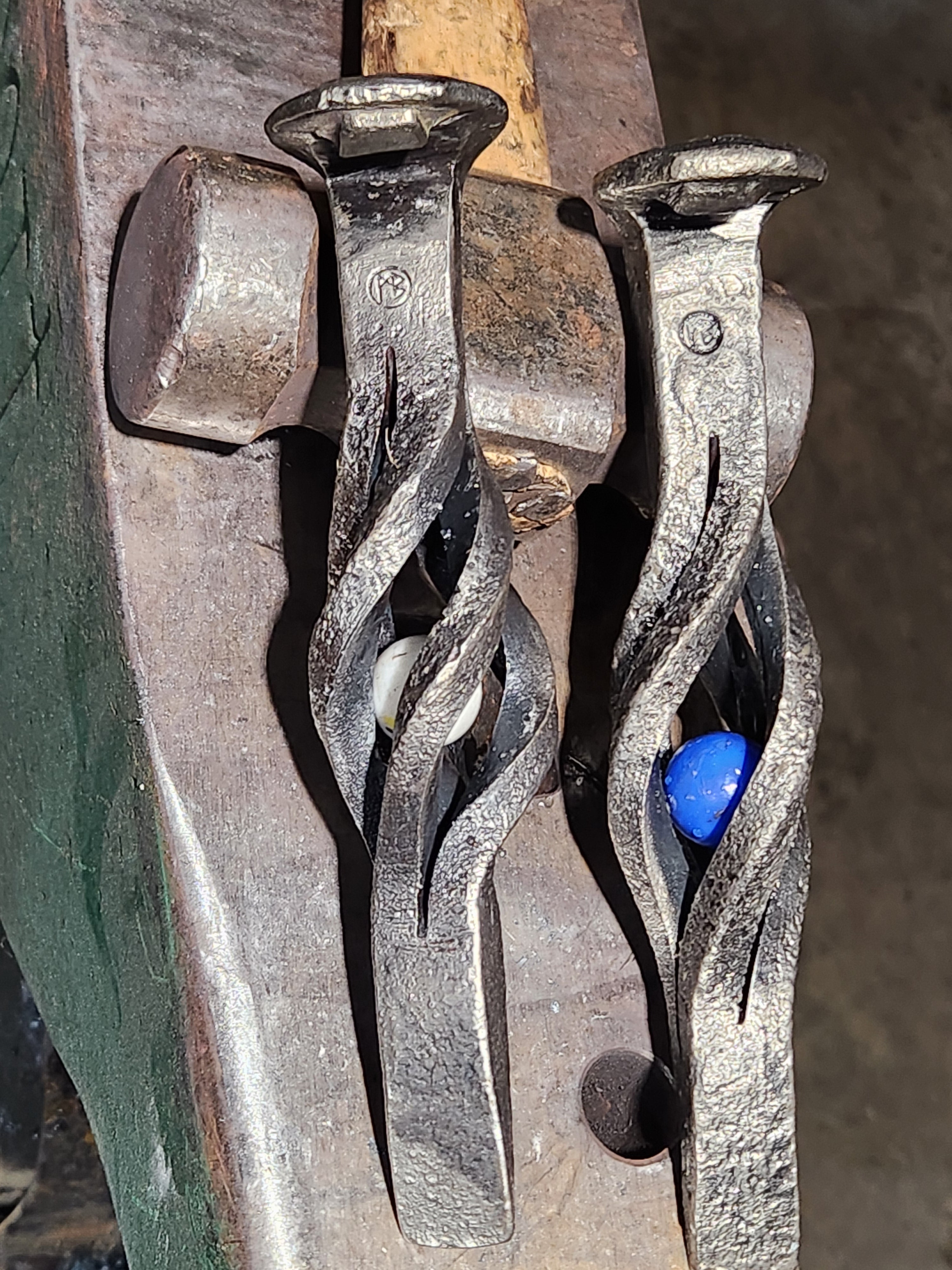 Railroad spike bottle opener