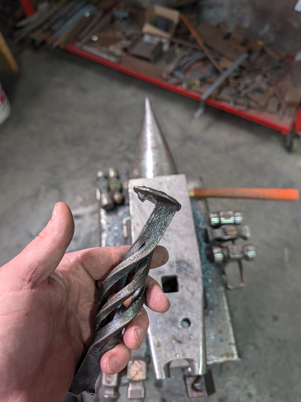 Railroad spike bottle opener